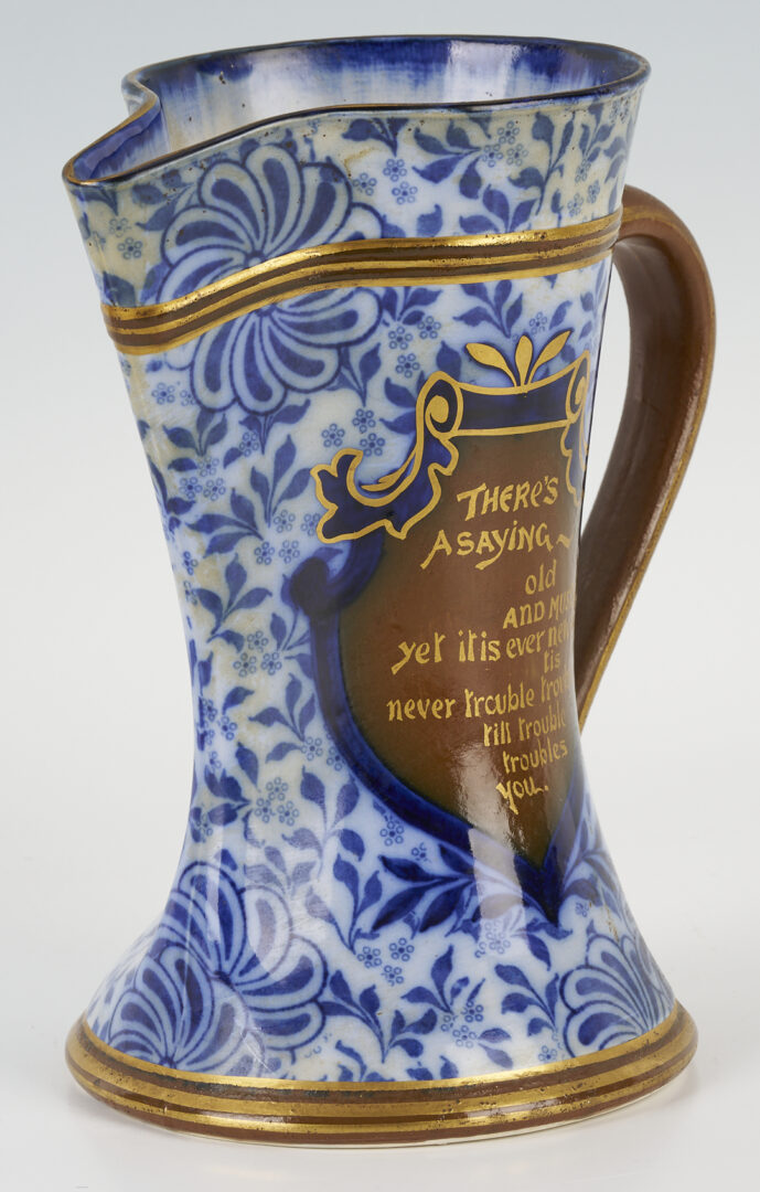 Lot 1023: Royal Doulton Blue "Trouble" Pitcher plus English Stoneware Monkey Humidor