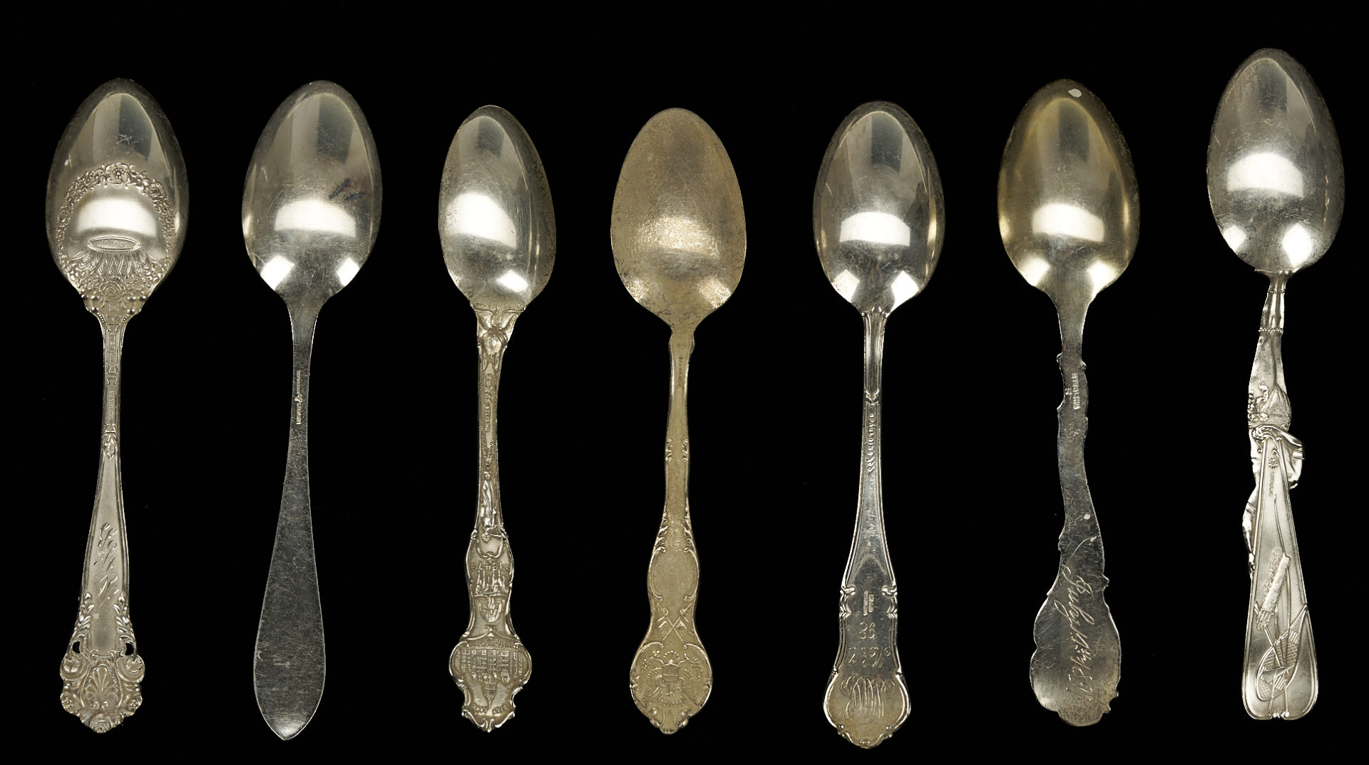 Lot 1077: 37 Assembled Sterling Silver Spoons, mostly Souvenir