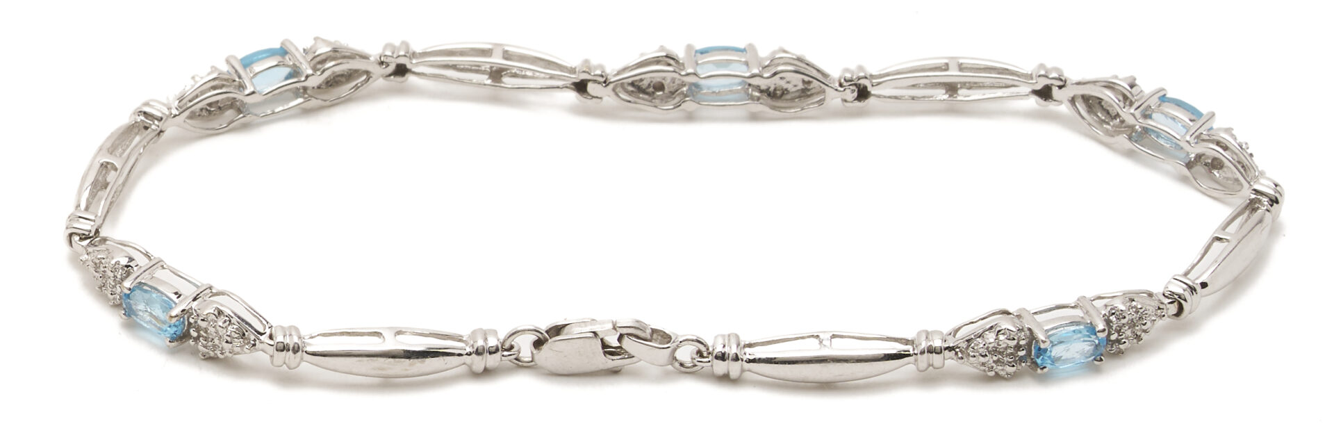 Lot 1225: Three (3) Ladies' Bracelets: 14K Yellow & White Gold Bracelet, 10K Yellow Gold & Sapphire Bracelet, and 10K White Gold & Blue Topaz