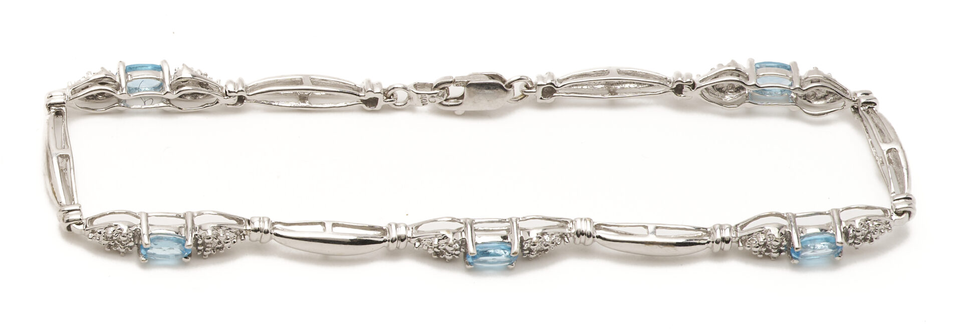 Lot 1225: Three (3) Ladies' Bracelets: 14K Yellow & White Gold Bracelet, 10K Yellow Gold & Sapphire Bracelet, and 10K White Gold & Blue Topaz