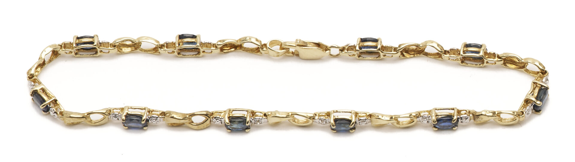 Lot 1225: Three (3) Ladies' Bracelets: 14K Yellow & White Gold Bracelet, 10K Yellow Gold & Sapphire Bracelet, and 10K White Gold & Blue Topaz