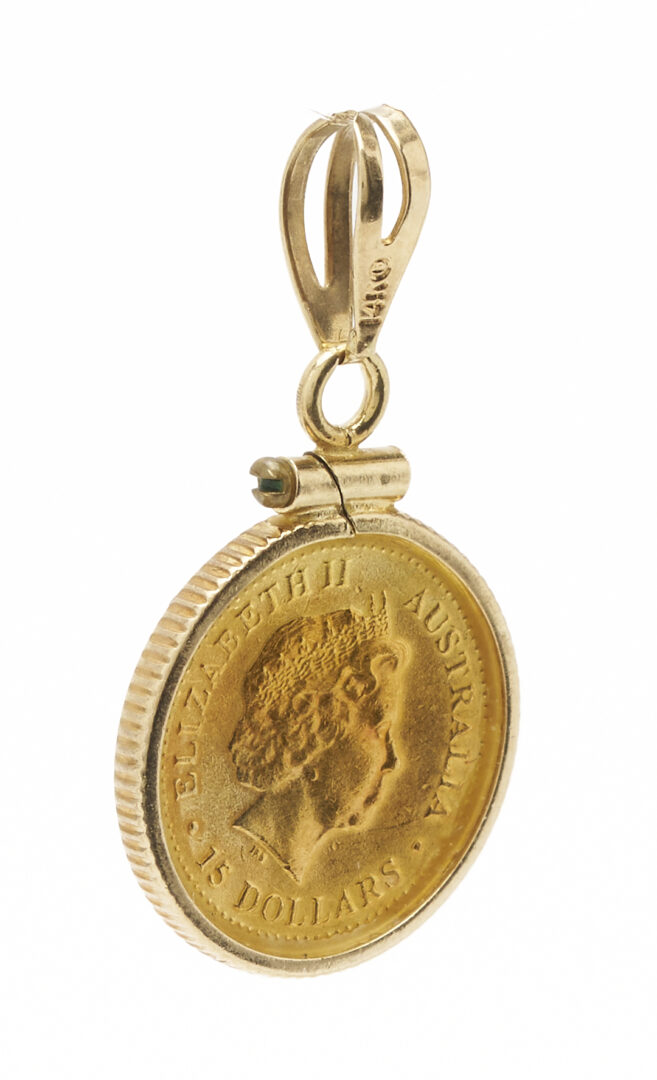 Lot 1237: 14K Italian Yellow Gold Cross Necklace and Australian 14K Yellow Gold Bezel Coin Pendant