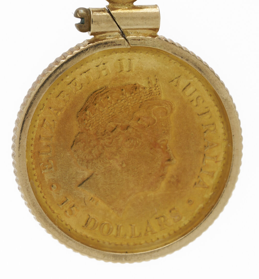 Lot 1237: 14K Italian Yellow Gold Cross Necklace and Australian 14K Yellow Gold Bezel Coin Pendant