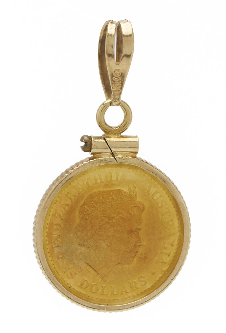 Lot 1237: 14K Italian Yellow Gold Cross Necklace and Australian 14K Yellow Gold Bezel Coin Pendant