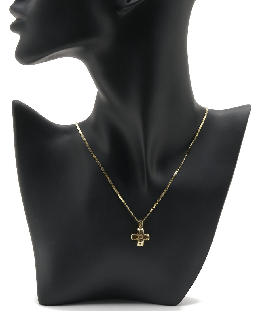 Lot 1237: 14K Italian Yellow Gold Cross Necklace and Australian 14K Yellow Gold Bezel Coin Pendant