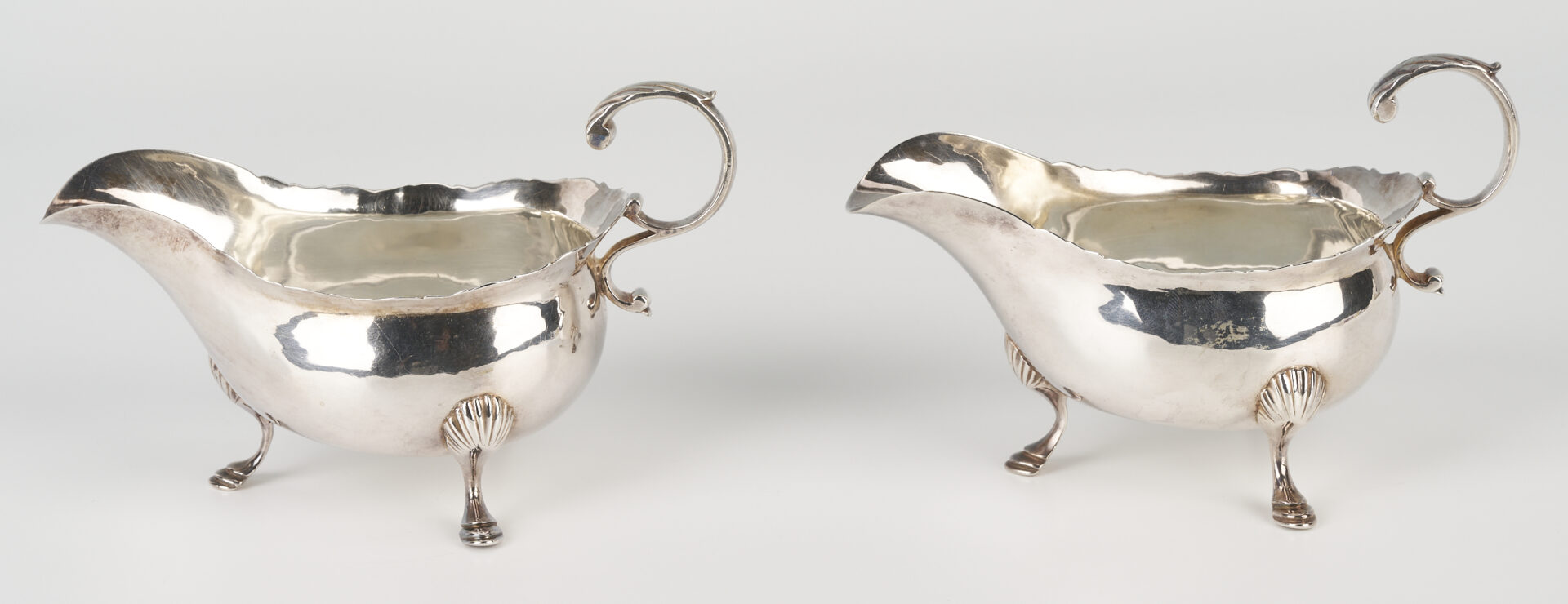 Lot 317: Pair 18th Century George III Sterling Silver Sauce Boats