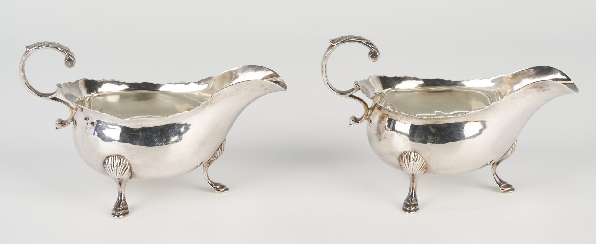 Lot 317: Pair 18th Century George III Sterling Silver Sauce Boats