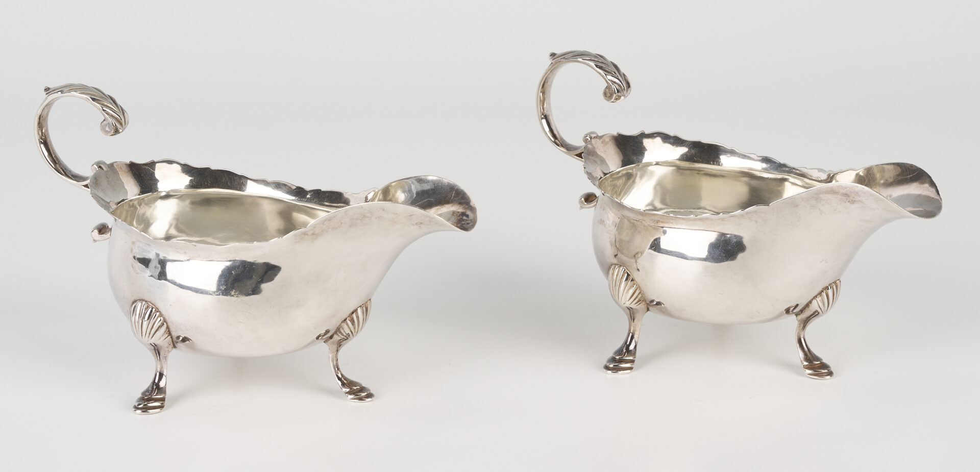 Lot 317: Pair 18th Century George III Sterling Silver Sauce Boats