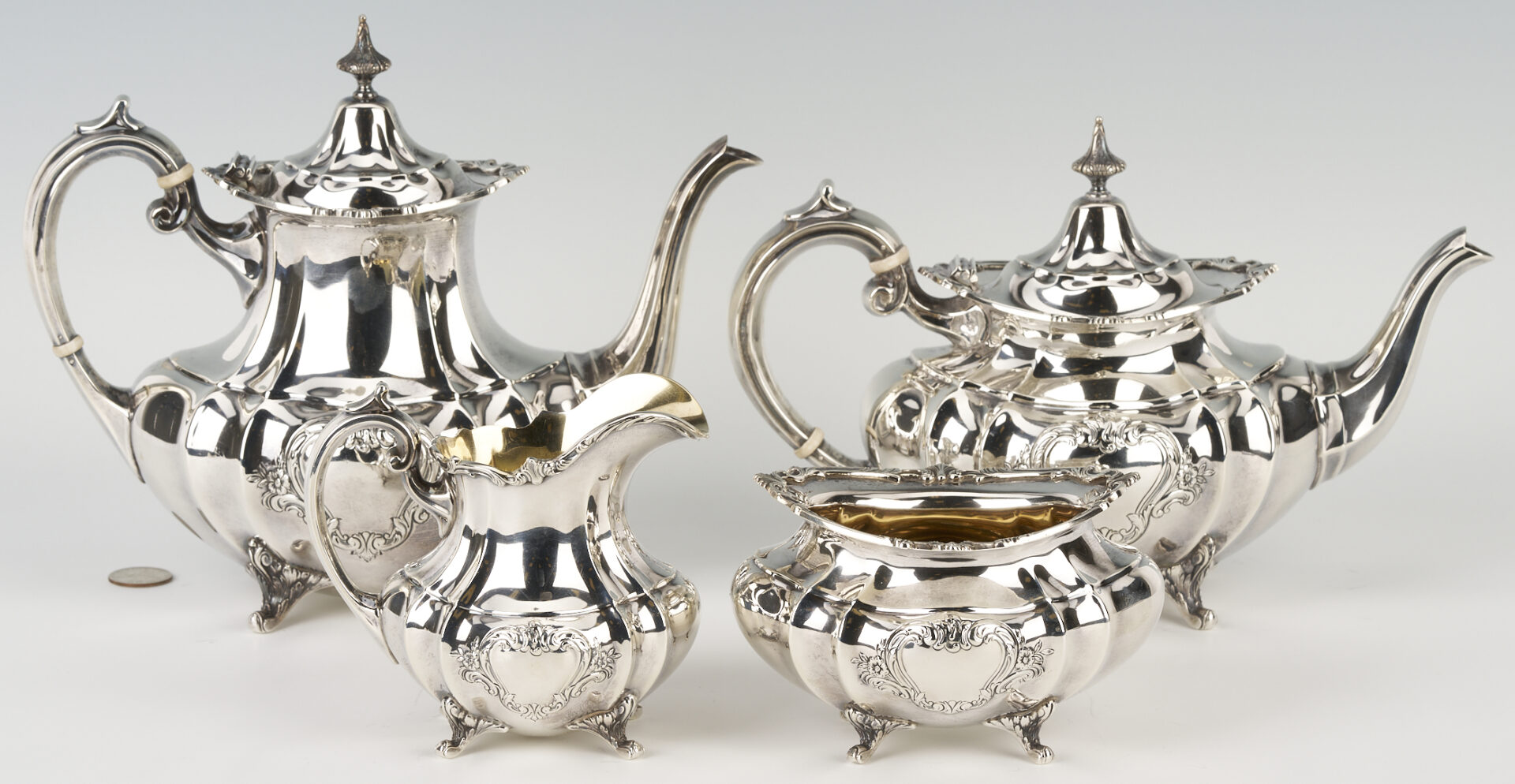 Lot 332: Reed & Barton 4-Pc. Sterling Tea Set, Hampton Court Shield