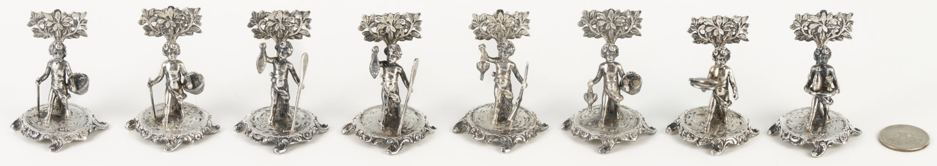 Lot 340: 8 Sterling Figural Menu or Place Card Holders