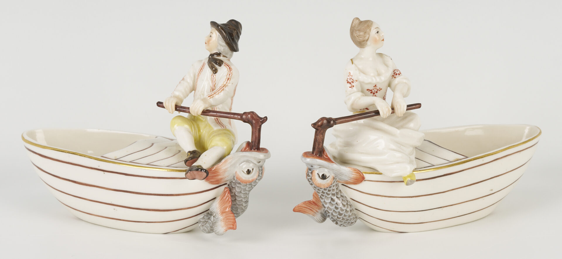 Lot 463: Polish Faience Porcelain Figure of Man with Pig, Plus Pair of Nymphenburg Salts