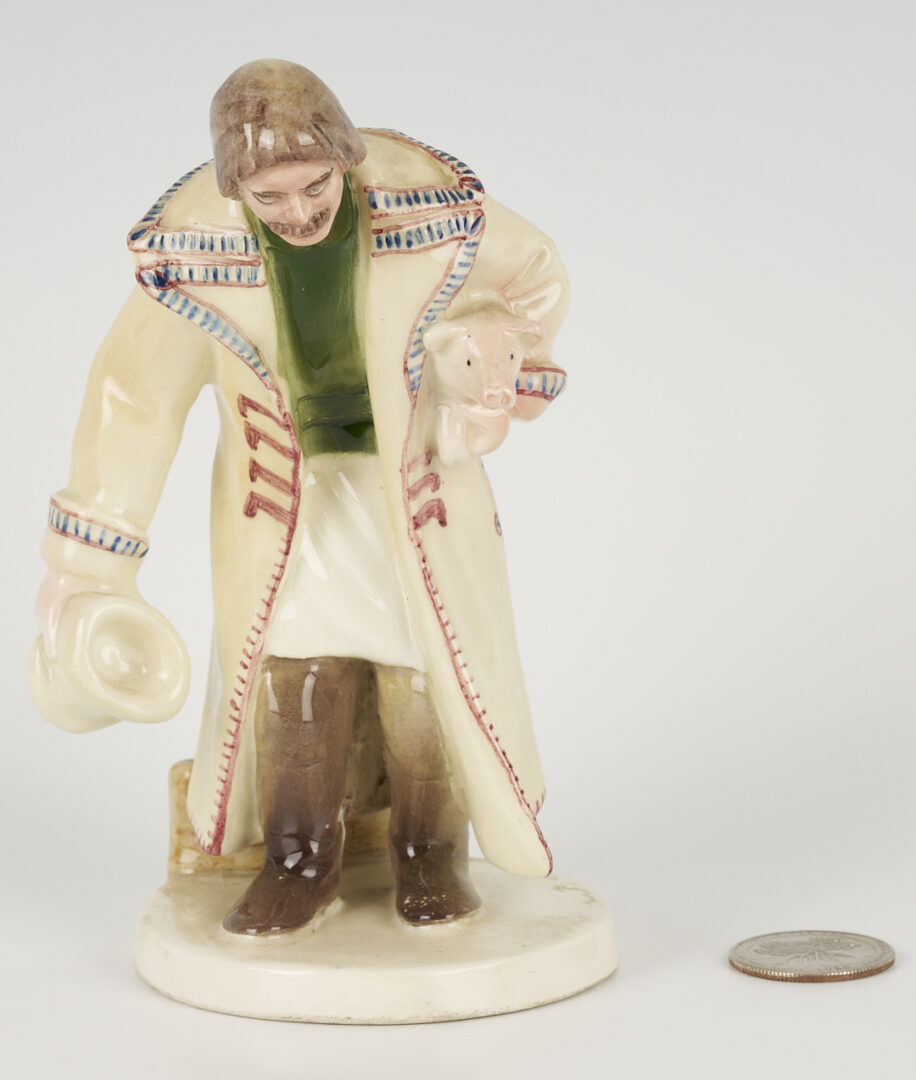 Lot 463: Polish Faience Porcelain Figure of Man with Pig, Plus Pair of Nymphenburg Salts