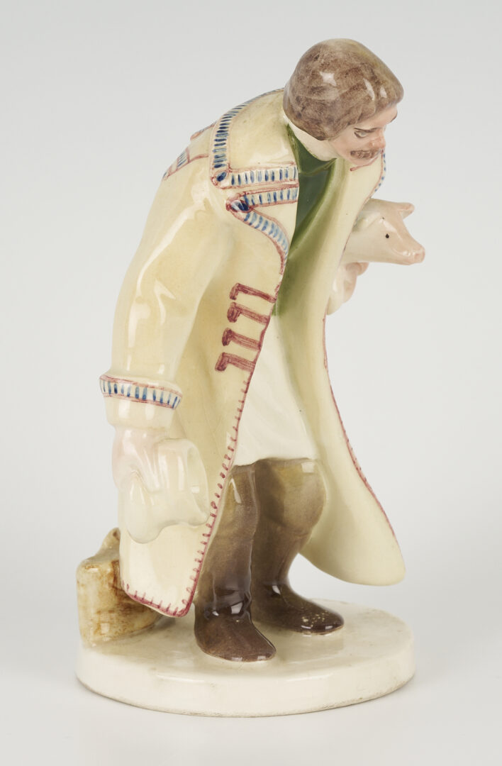 Lot 463: Polish Faience Porcelain Figure of Man with Pig, Plus Pair of Nymphenburg Salts