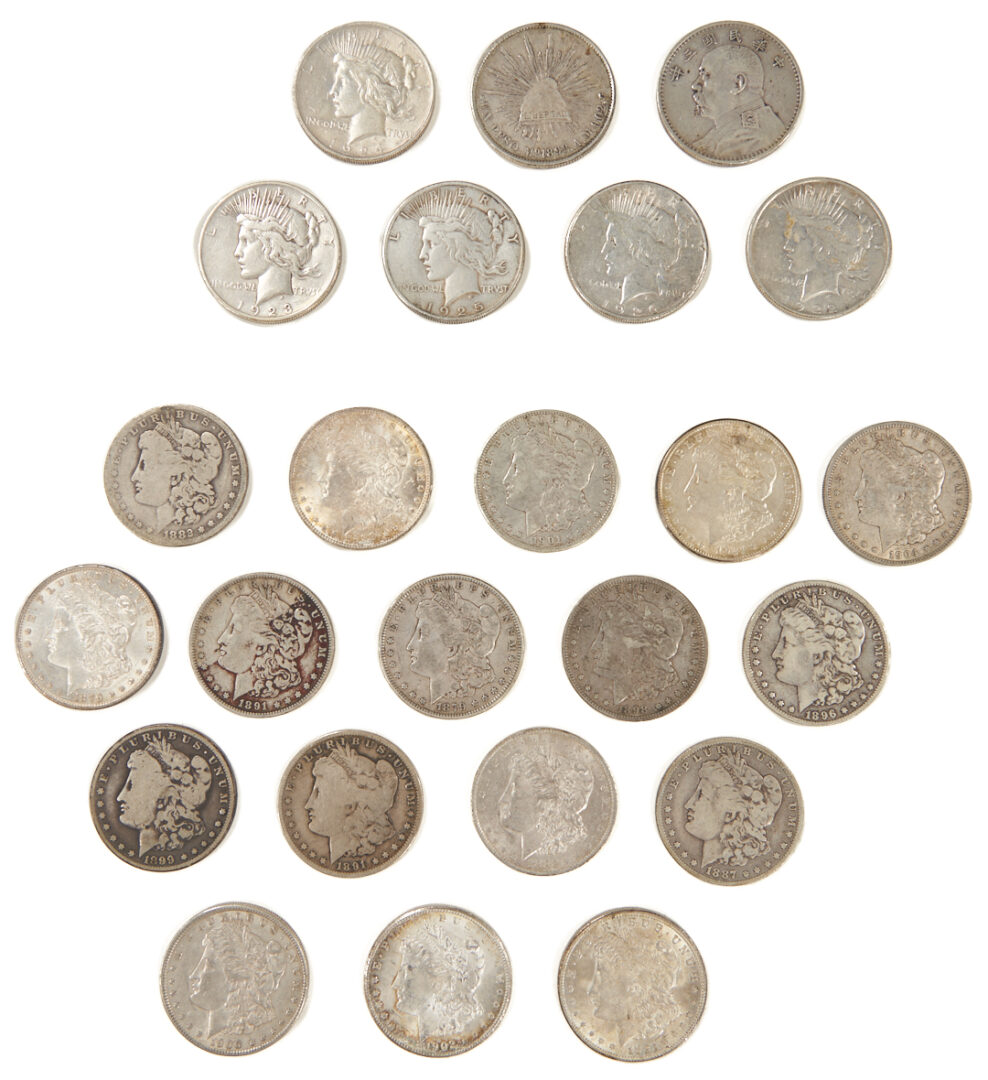 Lot 675: Group of 17 US Morgans, 5 Peace Silver Dollars, Yaun Shikai Dollar & Mexican Peso