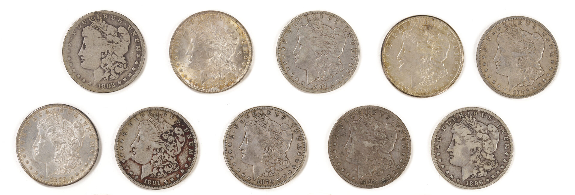 Lot 675: Group of 17 US Morgans, 5 Peace Silver Dollars, Yaun Shikai Dollar & Mexican Peso