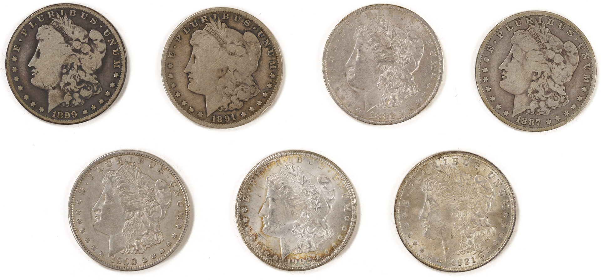 Lot 675: Group of 17 US Morgans, 5 Peace Silver Dollars, Yaun Shikai Dollar & Mexican Peso