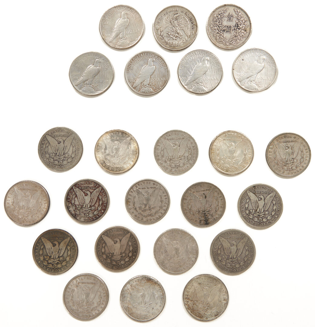 Lot 675: Group of 17 US Morgans, 5 Peace Silver Dollars, Yaun Shikai Dollar & Mexican Peso