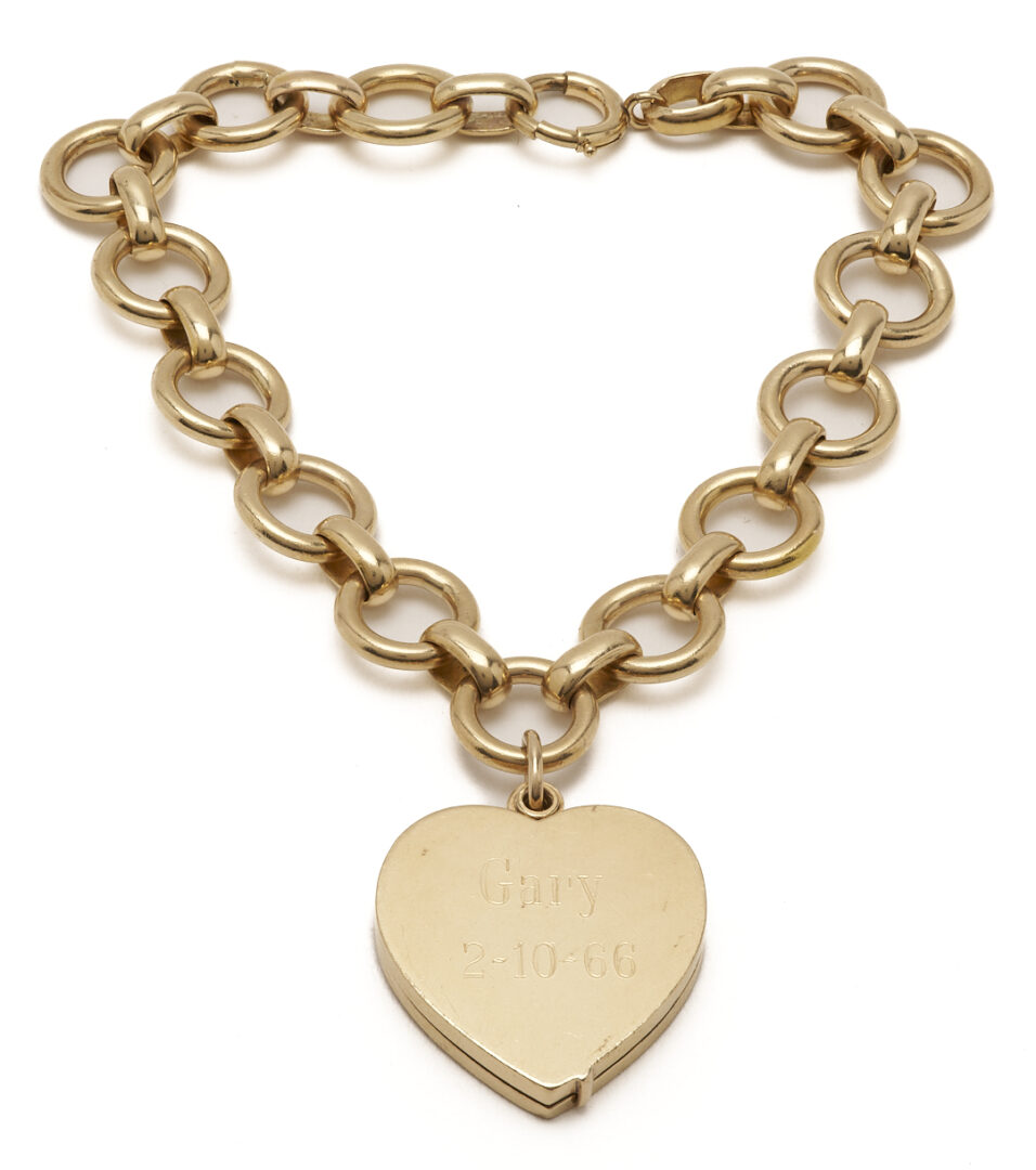 Lot 686: 14K Gold Heart Locket Bracelet