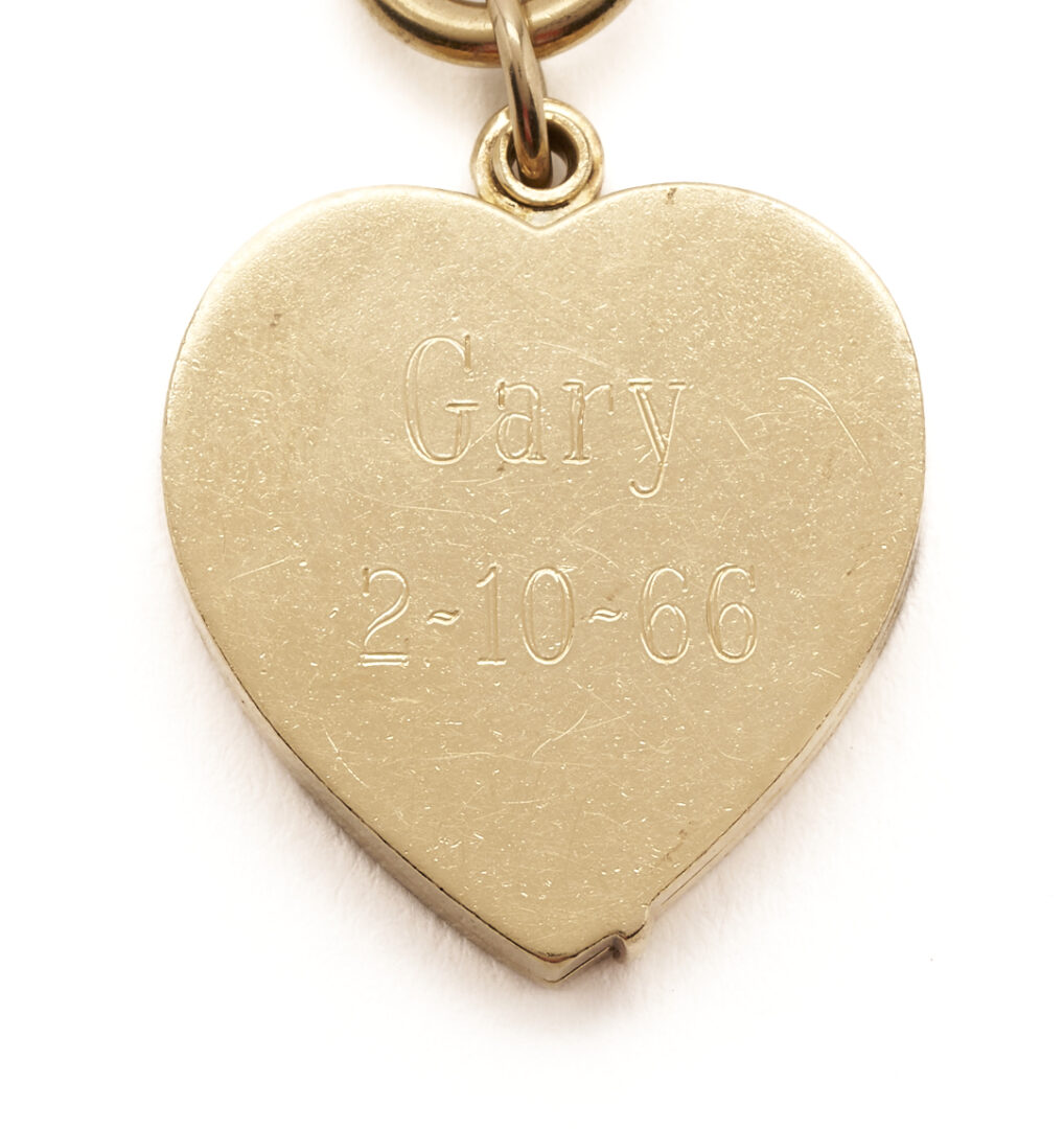 Lot 686: 14K Gold Heart Locket Bracelet