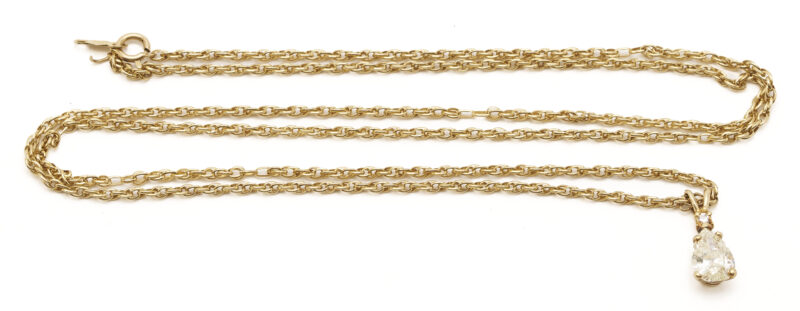 Lot 844: Lady’s 14K Yellow Gold Pear Cut Diamond Pendant & Rope Chain Necklace