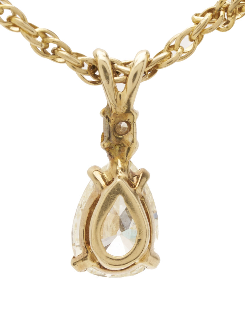 Lot 844: Lady's 14K Yellow Gold Pear Cut Diamond Pendant & Rope Chain Necklace