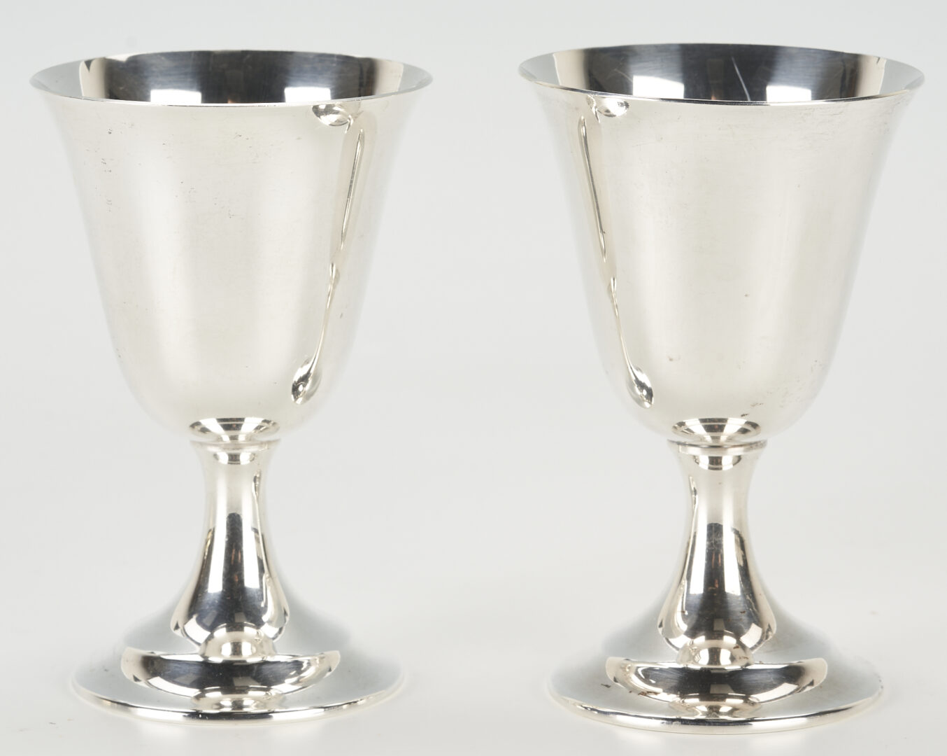 Lot 859: 12 International Sterling Wine Goblets plus 6 Napkin Rings