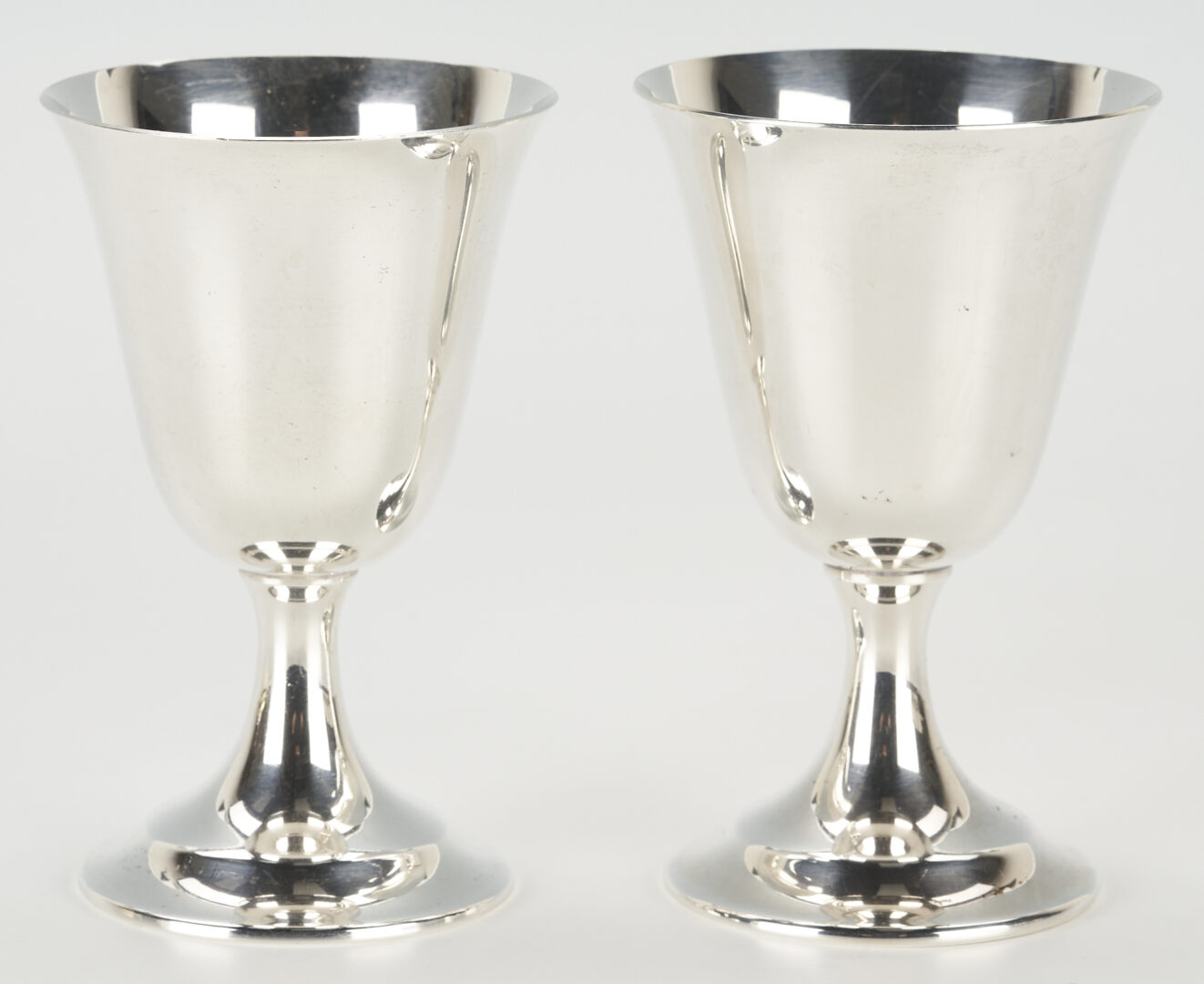 Lot 859: 12 International Sterling Wine Goblets plus 6 Napkin Rings