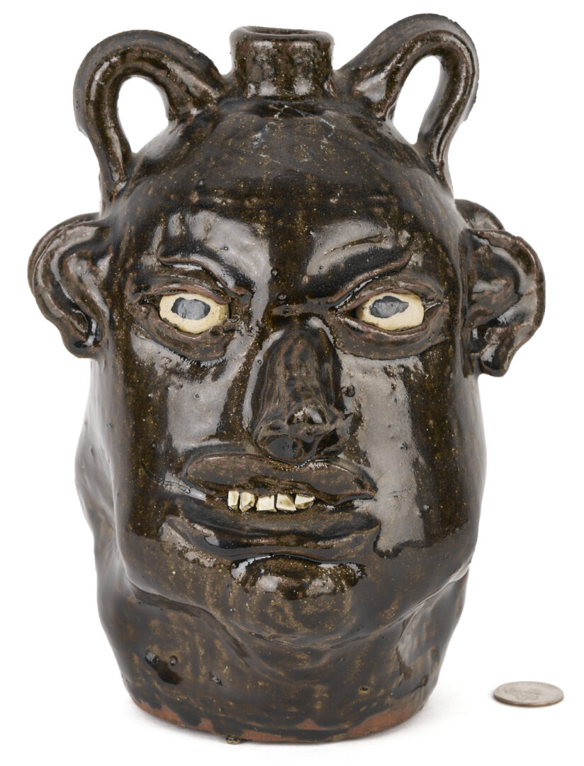 Lot 993: Chester Hewell Folk Art Double Face Jug