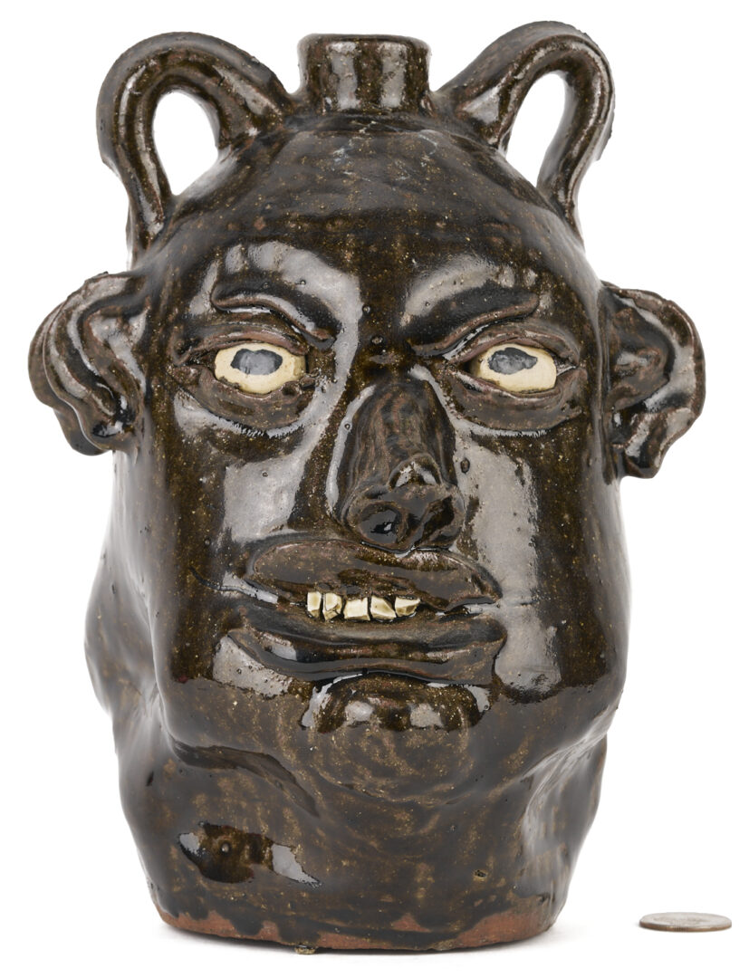 Lot 993: Chester Hewell Folk Art Double Face Jug