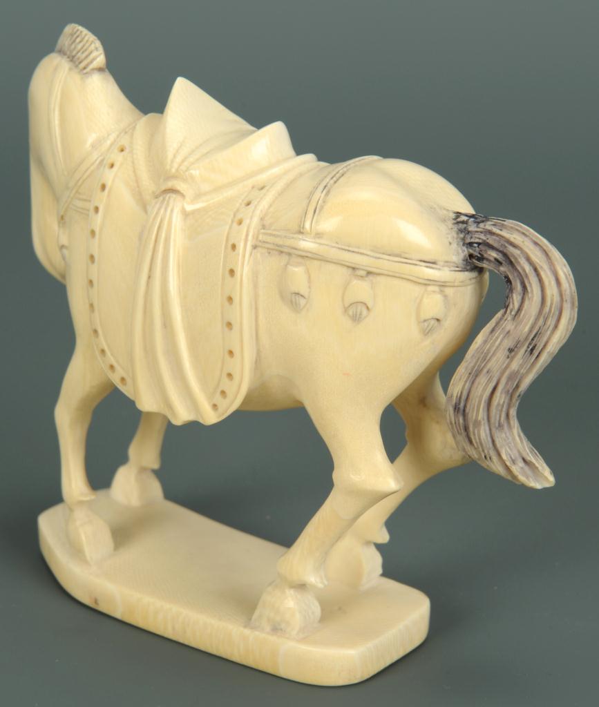 Lot 16: Finely carved ivory horse okimono