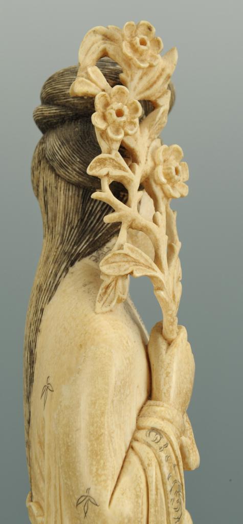 Lot 18: Carved ivory Guan Yin figure with prunus, 12"H