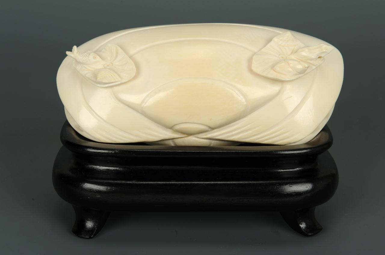 Lot 215: Large Chinese carved ivory clamshell, 6"W