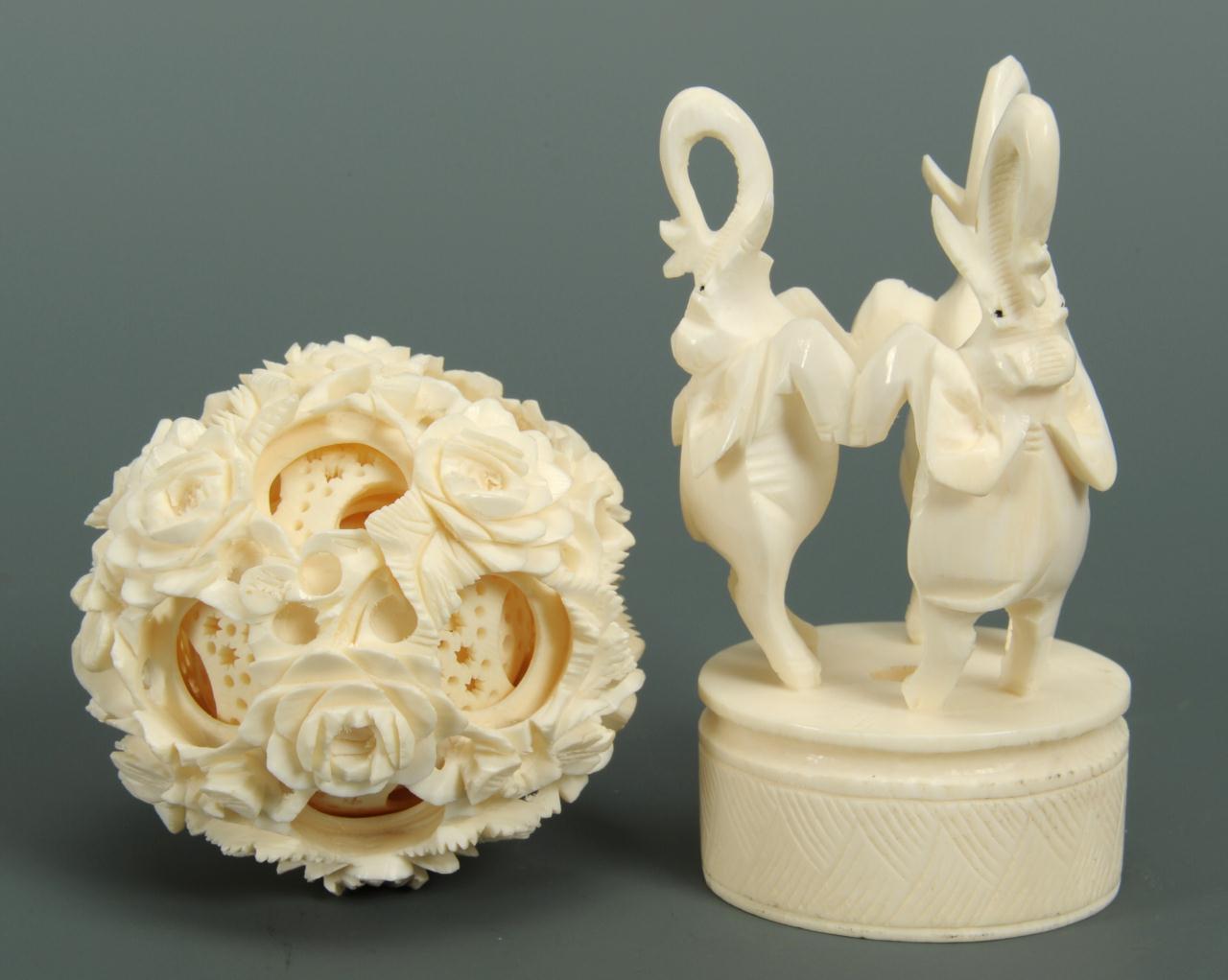 Lot 216: Chinese carved ivory elephants with puzzle ball