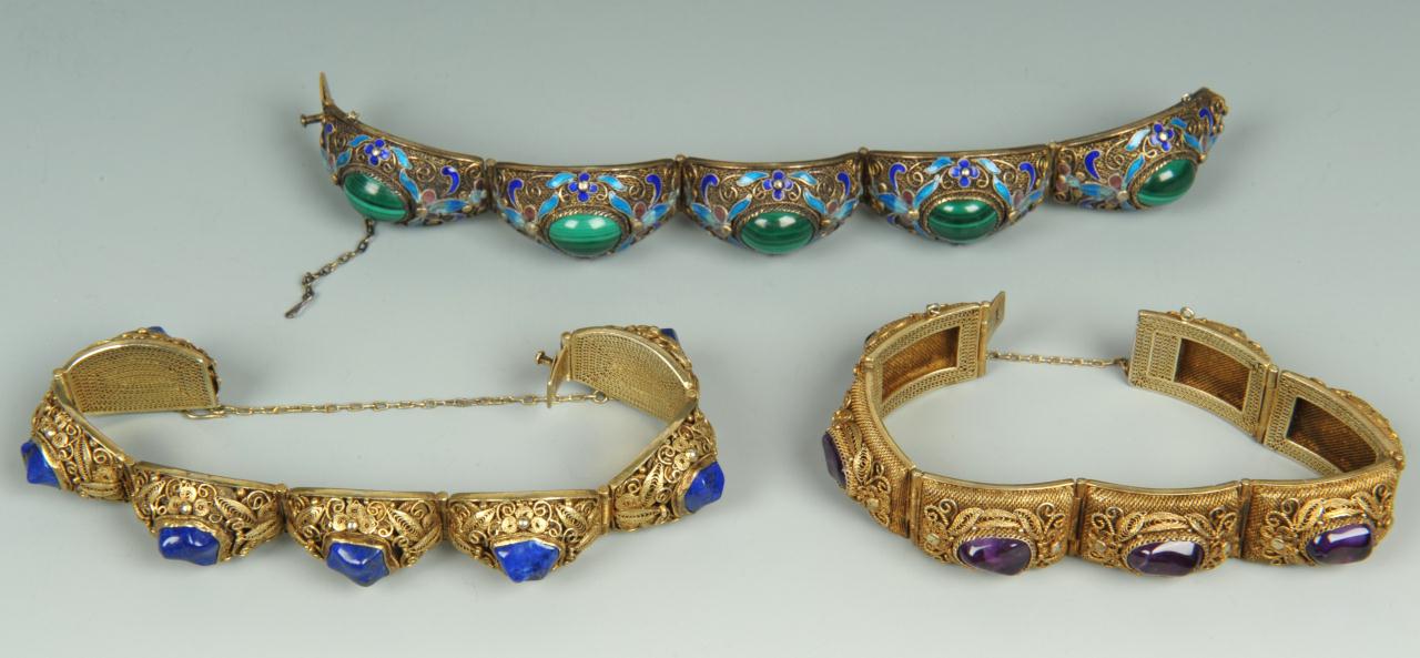 Lot 218: Three Chinese Silver and Stone Bracelets