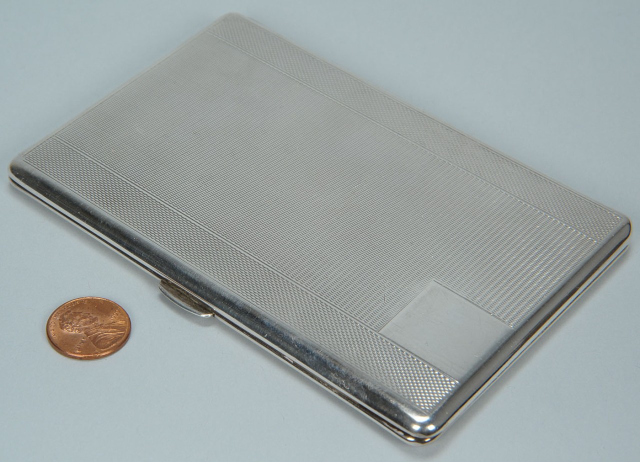 Lot 269: Sterling cigarette case and silver overlay flask