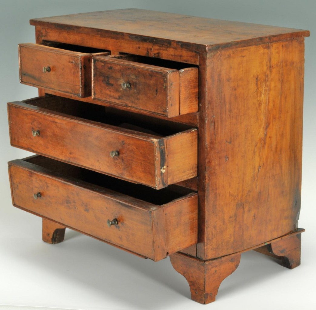 Lot 288: Miniature chest of drawers