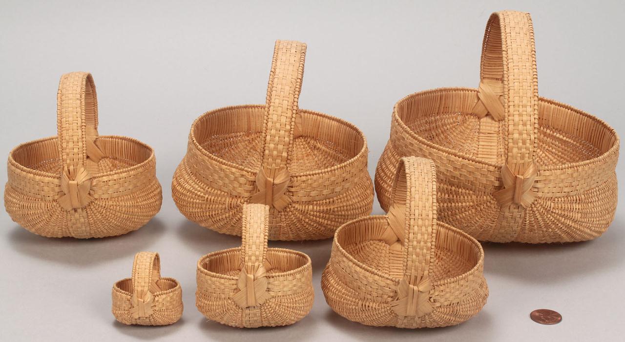 Lot 297: Set of 6 miniature buttocks baskets