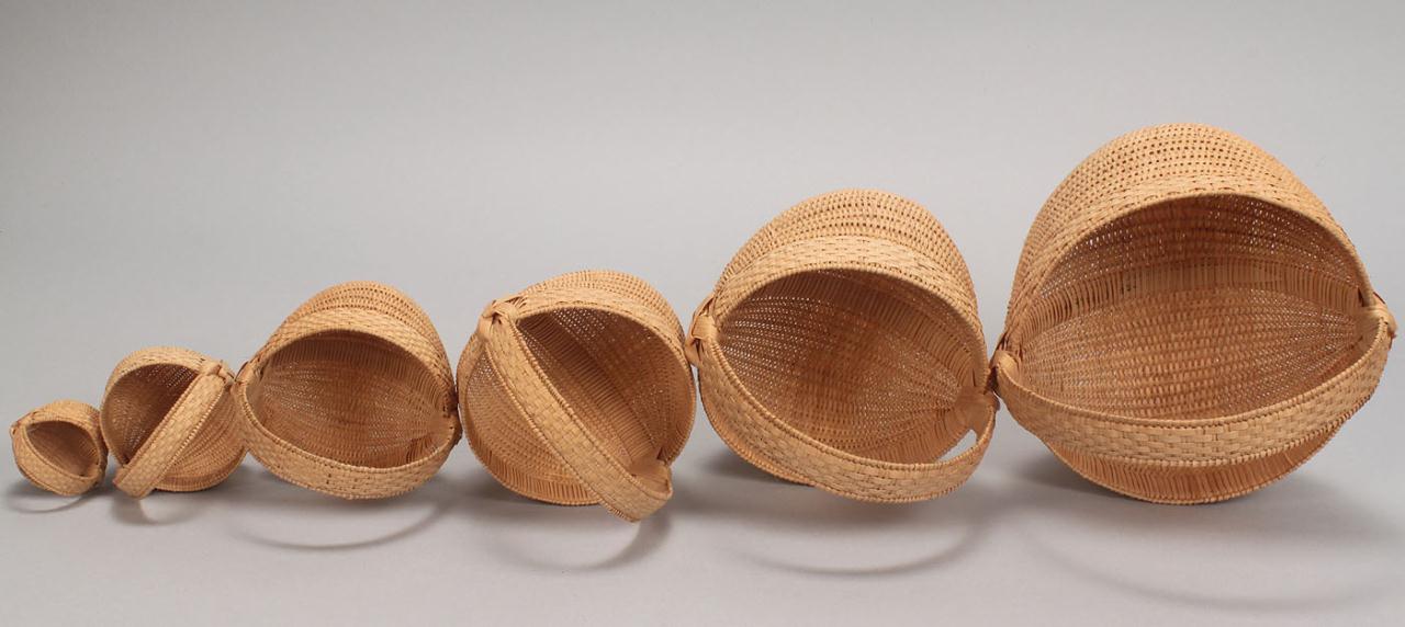 Lot 297: Set of 6 miniature buttocks baskets