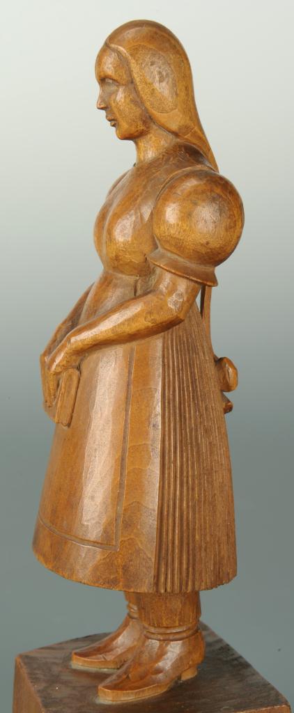Lot 300: WPA style wood carving of a girl, 1934