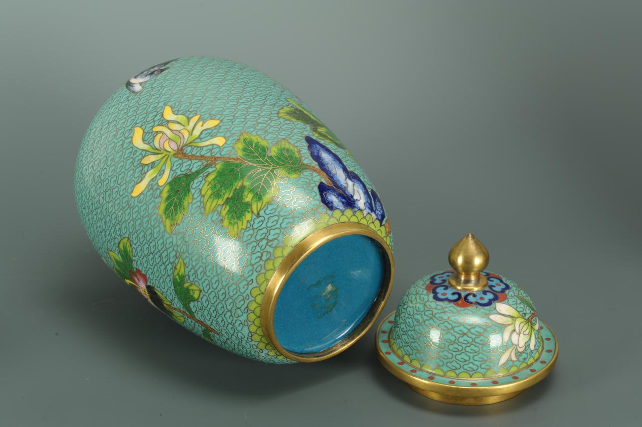 Lot 394: 4 pcs. Chinese Cloisonne including jars and flower