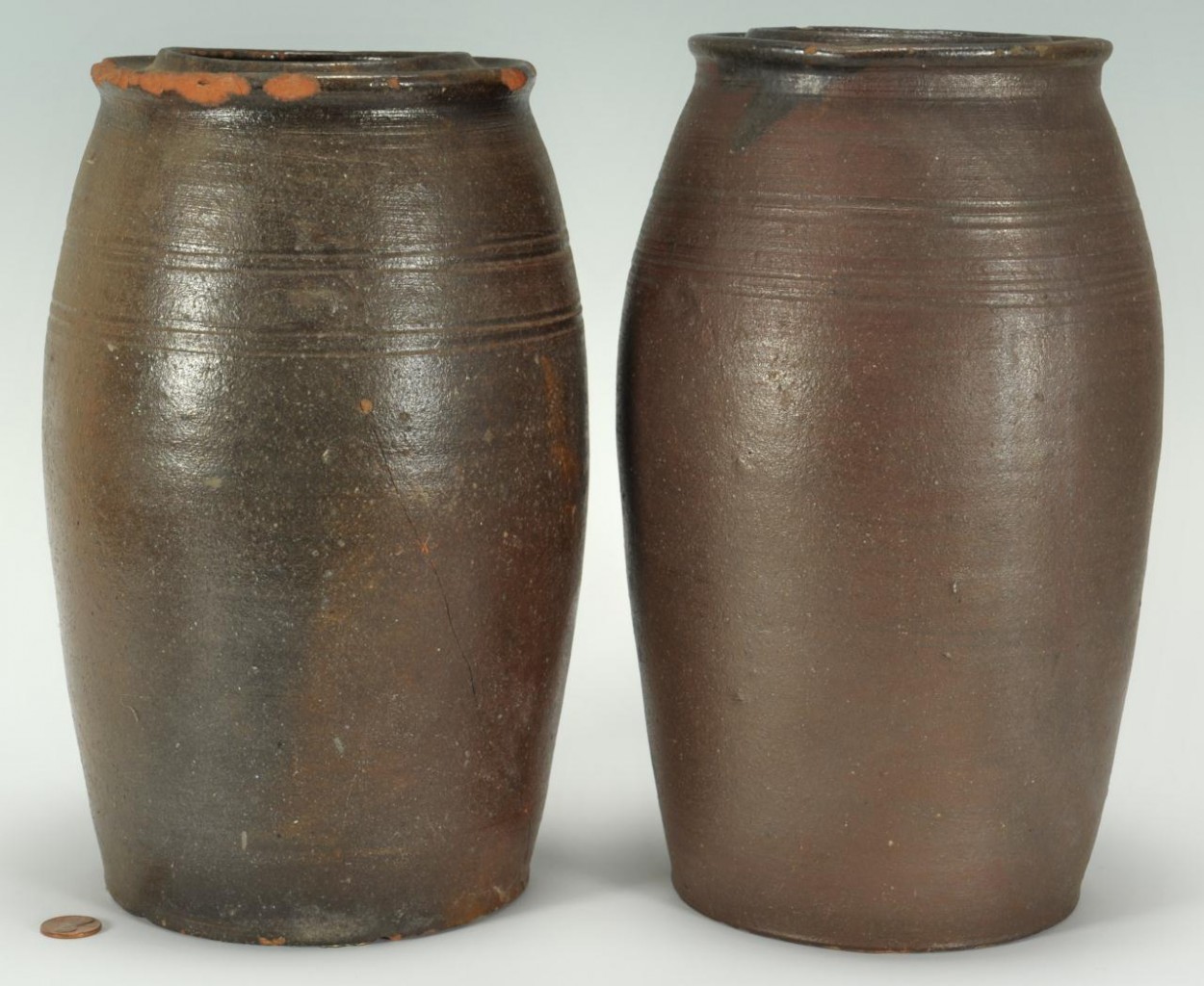 Lot 426: Pair of Large East TN Preserving Jars, attrib. Mor