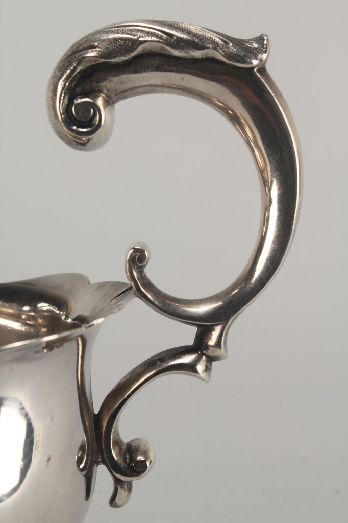 Lot 457: Coin silver sauce boat and creamer