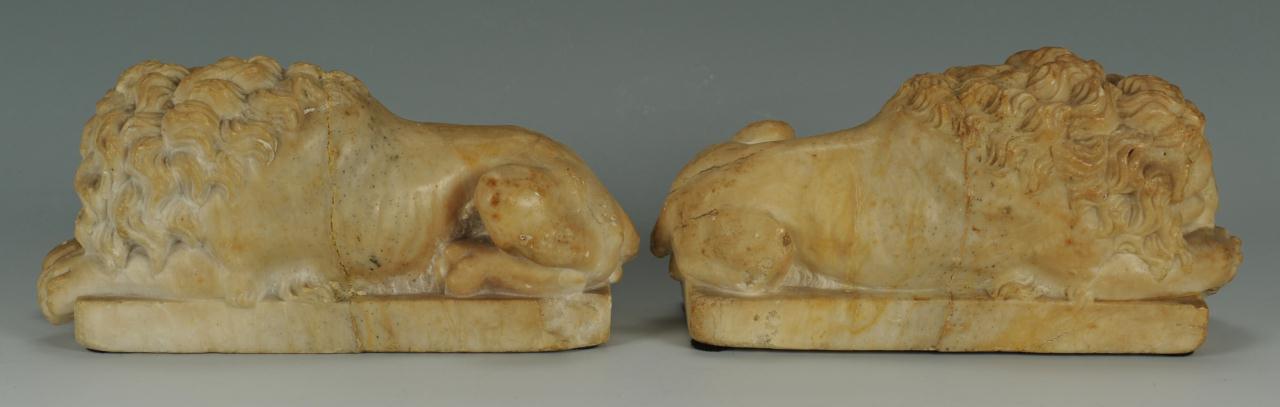 Lot 493: Pair of Marble Recumbent Lions, after Canova