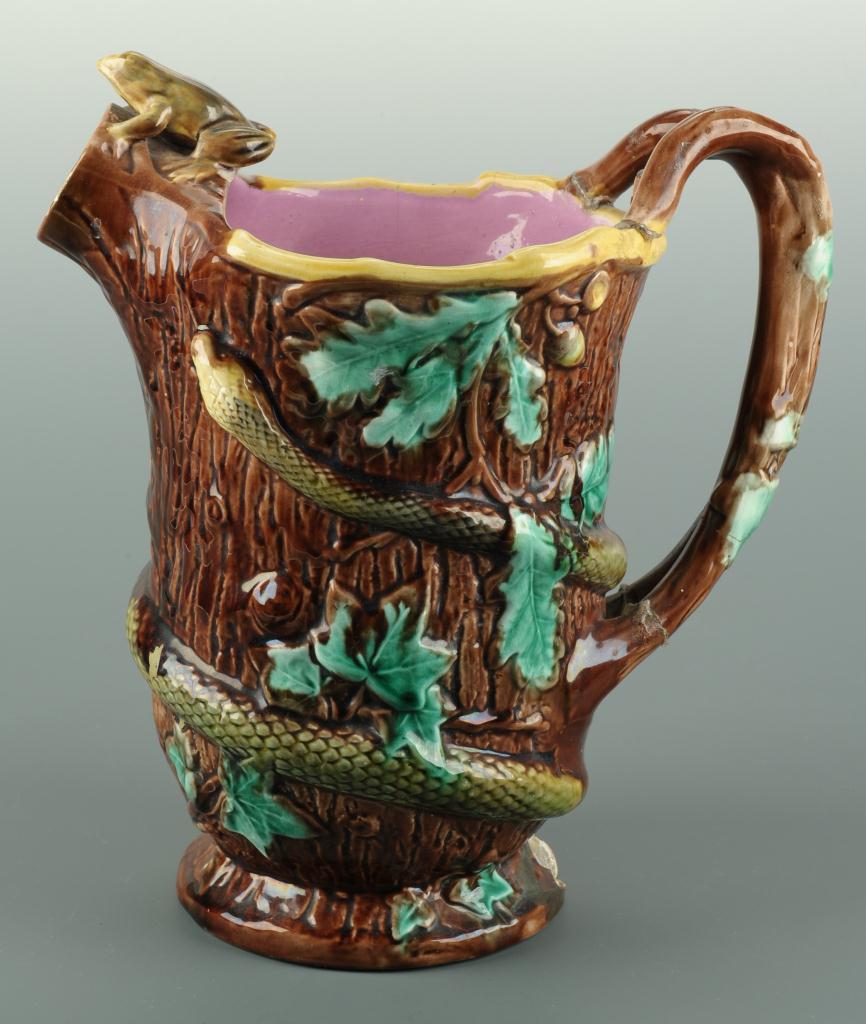 Lot 570: Majolica frog pitcher and two platters
