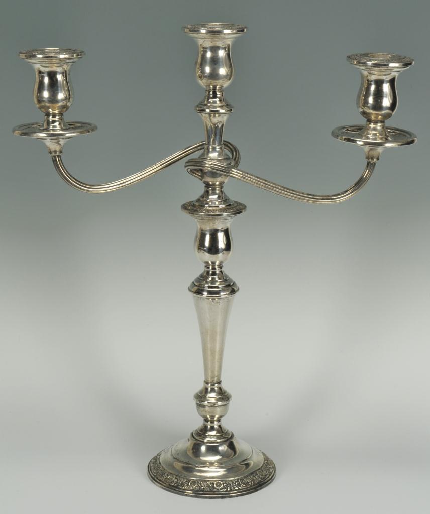 Lot 577: Weighted Prelude Candelabra and candlesticks