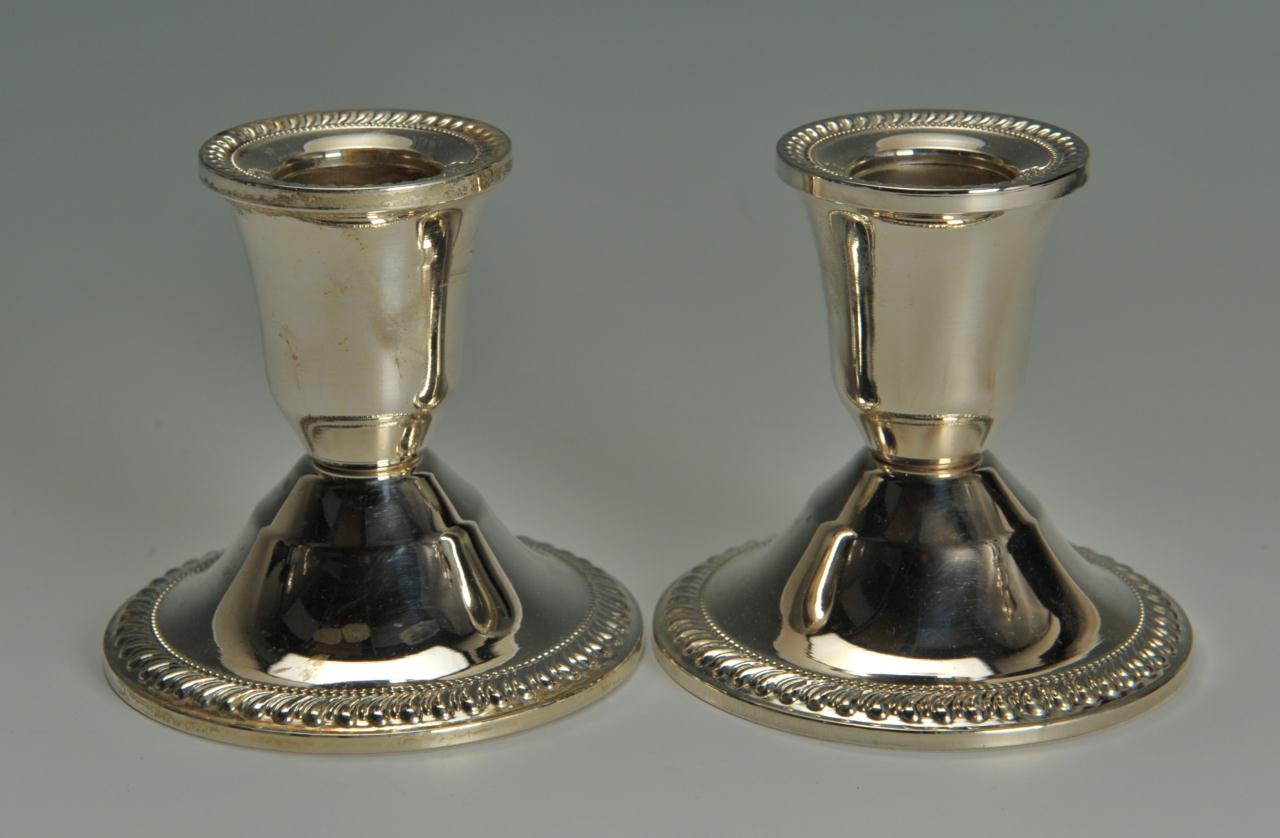 Lot 577: Weighted Prelude Candelabra and candlesticks