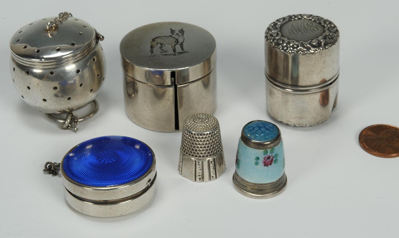 Lot 583: Group of six silver novelties inc. sewing