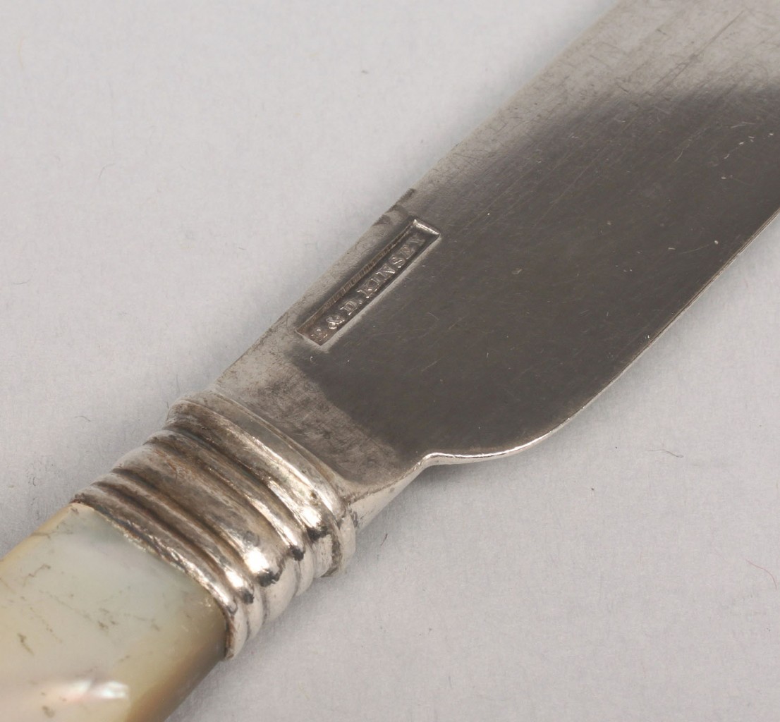 Lot 69: 10 Kinsey silver knives w/pearl handles
