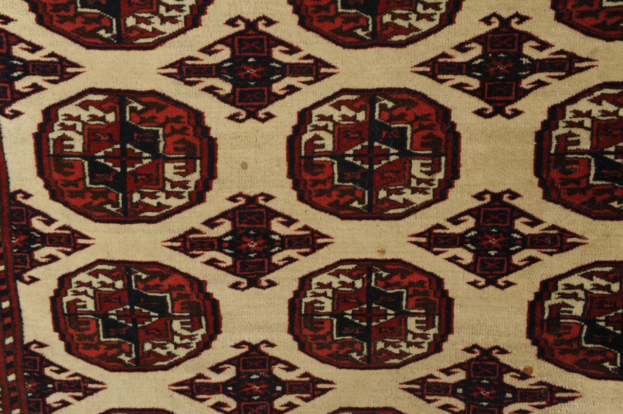 Lot 702: 2 Persian Turkoman Rugs, 6'6" x 5' and 5'3" x 3'5"