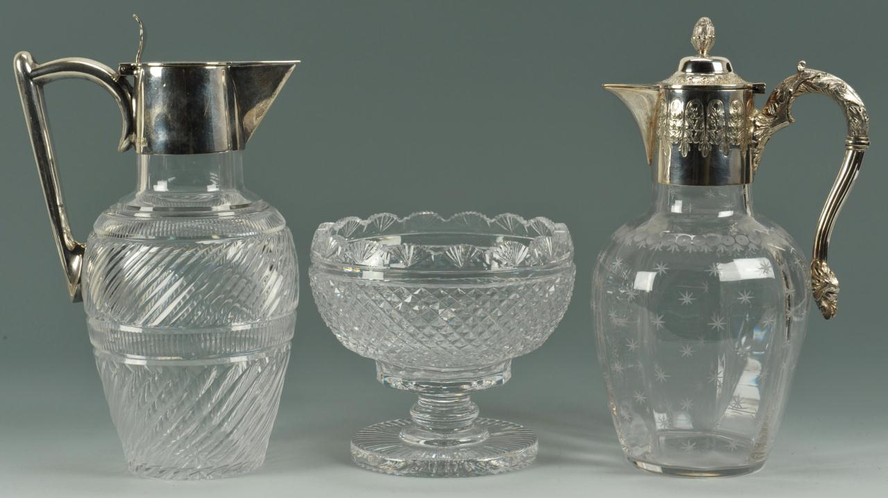 Lot 714: 2 crystal and silverplated claret jugs and a bowl